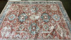 lot 2040 image: Washable 8x10 Area Rug. Multicolored.