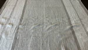lot 2075 image: Threshold TanCream 7x10 Area Rug.