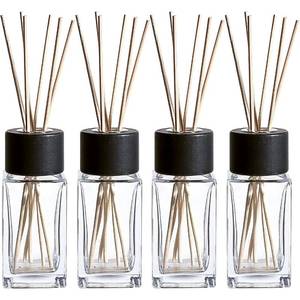 lot 44372 image: Natural Diffuser Reeds Bottles Sticks  Clear Glass Home Decor for Kitchen and Living Room  Black Wood Caps  Decorative Fragrance Set with Long Lasting Aroma - Set of 4 - Retail $20