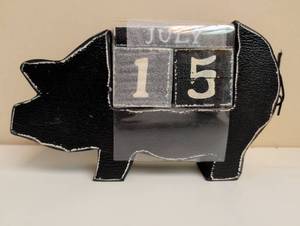 lot 16916 image: Black Wooden Pig Perpetual Block Calendar