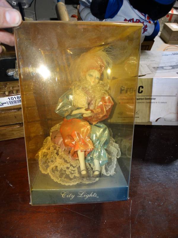 lot 10191 image: Costume Creations Musical Porcelain Doll