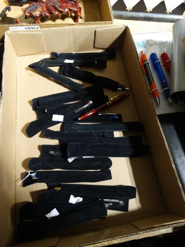 lot 10255 image: lot of pens with sleeves