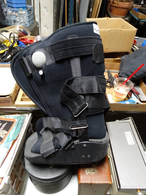 lot 10327 image: walking boot and shoes