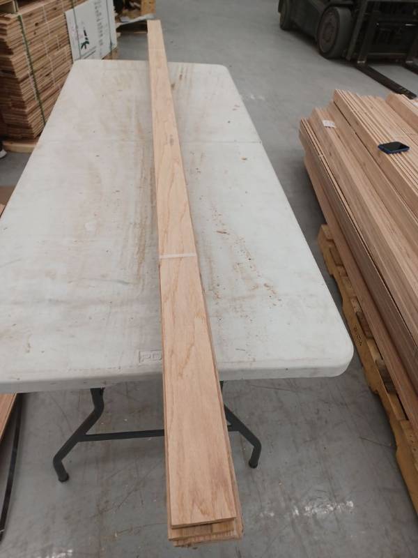 lot 4069 image: 10 Pieces Oak Base, 8ft L x 2 34 H, 80 Linear Feet