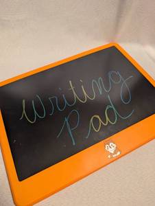 lot 2029 image: Orange Childrens Writing Pad