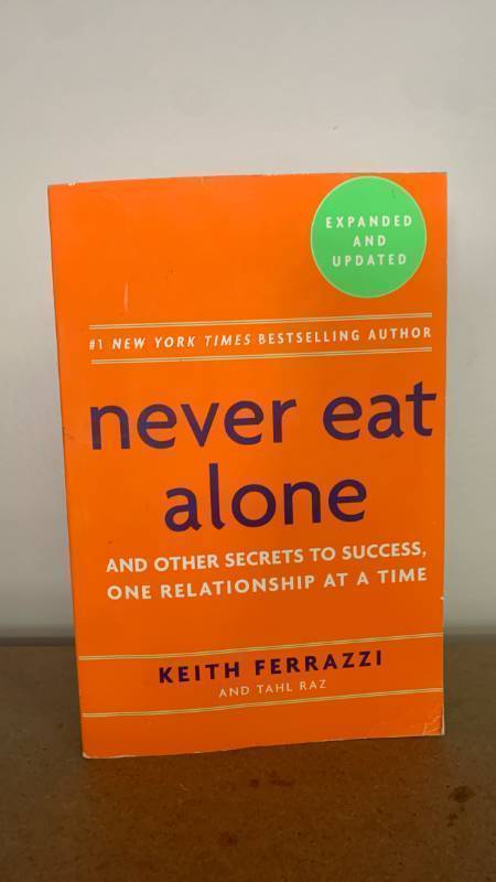 lot 675 image: Never Eat Alone and other secrets to success, one relationship at a time by Keith Ferrazzi paperback book