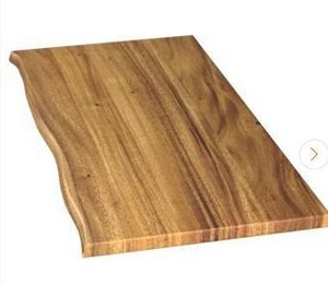 lot 25056 image: 4 ft. L x 25 in. D Finished Saman Solid Wood Butcher Block Countertop in with Live Edge- Retail $349