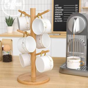 lot 838 image: Wisuce Bamboo Mug Tree with Thicker Base - Countertop Coffee Cup Stand with 6 Hooks - Retail $10
