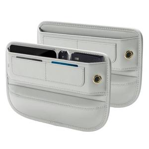lot 975 image: Owntow Premium Leather Car Seat Gap Filler Organizer, Universal Fit Interior Accessory with Card Slots, Car Center Console Organizer for Suv, Truck (Beige, 2 Pack) - Retail $40