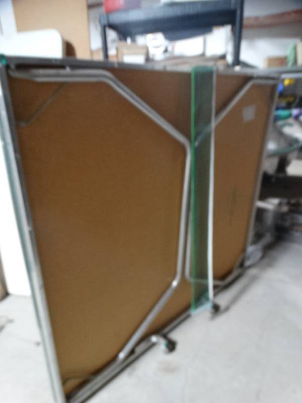 lot 14131 image: Folding ping-pong table on wheels