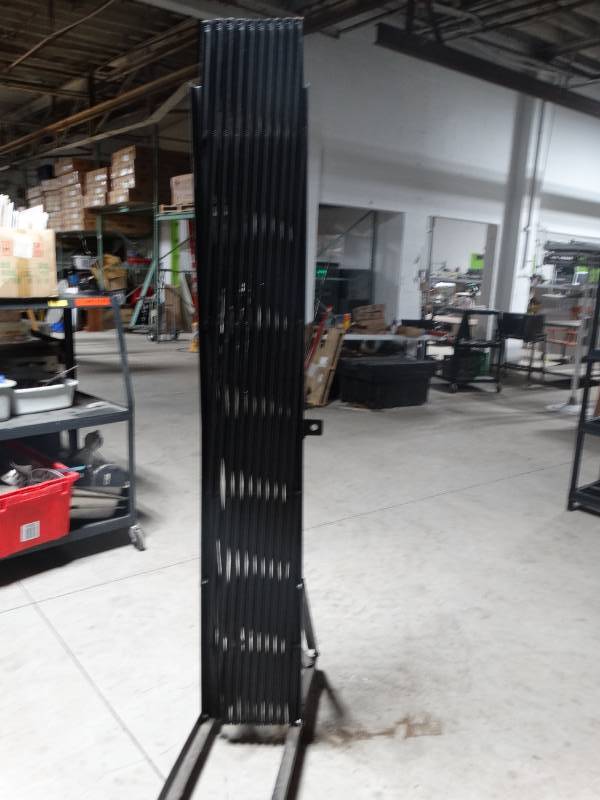 lot 14157 image: Expanding gate on wheels- 78 tall x 78 long