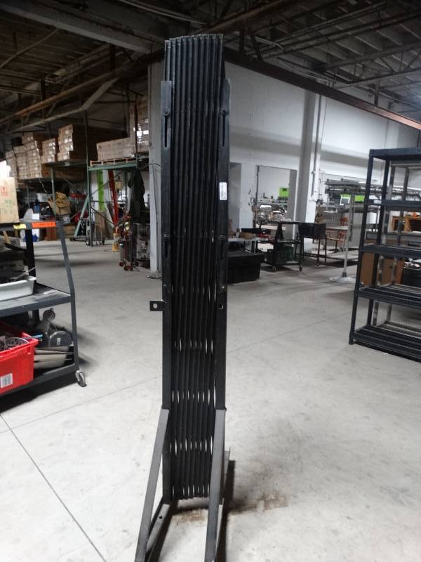 lot 14159 image: Expanding gate on wheels- 78 tall x 78 long