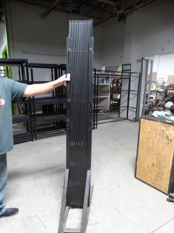 lot 14162 image: Expanding gate on wheels- 78 tall x 78 long