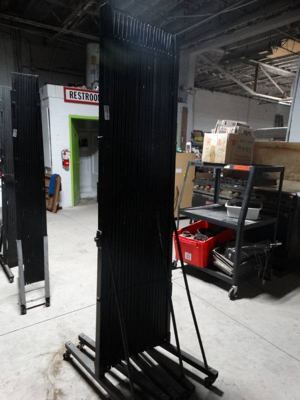 lot 14163 image: Expanding gate on wheels- 78 tall x 212 long