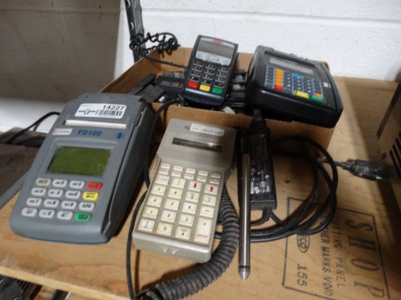 lot 14227 image: Lot of credit card machines and a flat full of pagers.