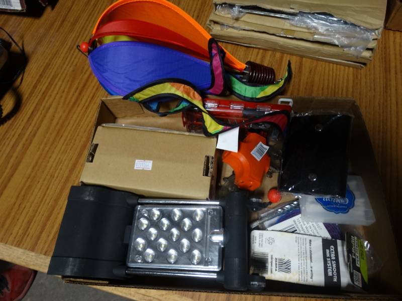 lot 14242 image: Drywe balls, light, windchime, Notebook rings, pin refills and more.