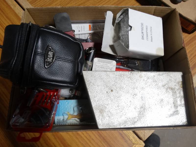 lot 14252 image: lot with drill bits, small measuring tape, box knife, fishing lores, etc.