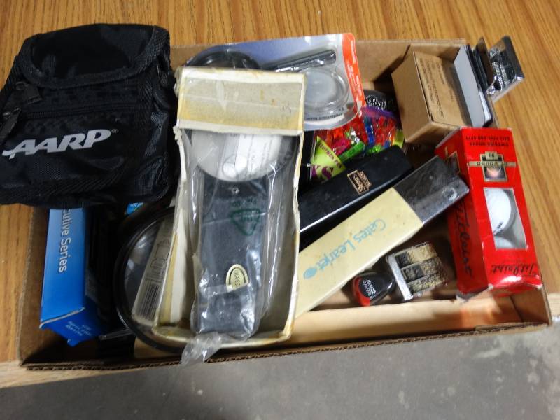 lot 14254 image: Lot with magnifine glasses, AARP bag, XS clothes pin clips, Small binder clips, etc.