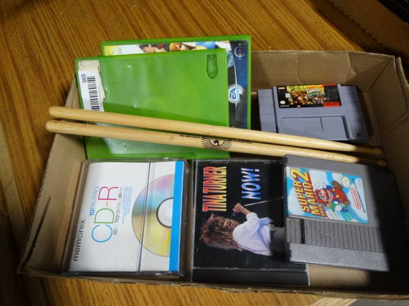 lot 14256 image: CDs donkey kong country 2 super nintendo game, Super mario 2 Nintendo drum sticks and 2 X BOX games- sims and grand theft auto san andres.