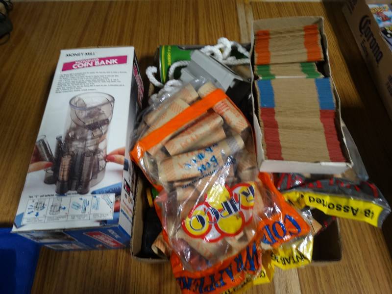 lot 14258 image: Motorized coin bank, Coin wrappers, rope, etc.