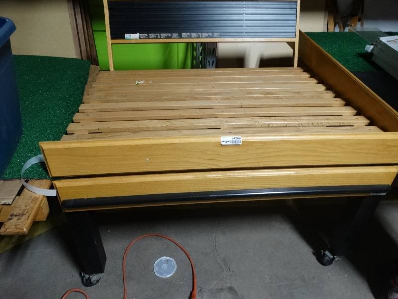 lot 14288 image: Wood adjustable produce table on wheels
