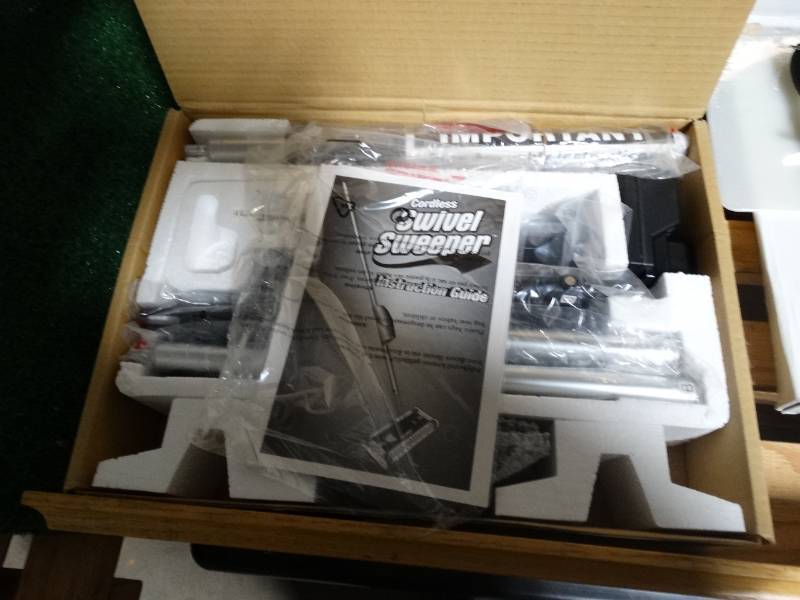 lot 14300 image: Cordless swivel sweeper- New in box