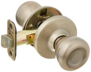 lot 5147 image: Kwikset 92001-512 Tylo Hall & Closet Knob in Antique Brass - Retail $11