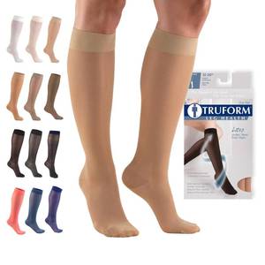 lot 5149 image: Truform Sheer Compression Stockings, 15-20 mmHg, Womens Knee High Length, 20 Denier, Light Beige, Small - Retail $14