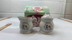 lot 20 image: Precious Moments Happy Holly Days Sugar and Creamer Set