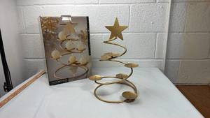 lot 24 image: Spiral Gold Star Candle Holder