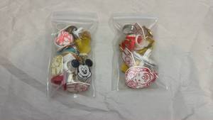 Vintage Disney-themed charms, keychains, pins and rings