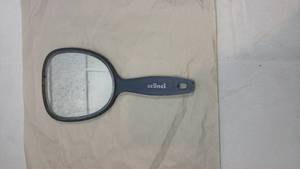 lot 94 image: Scunci Hand Mirror with Handle
