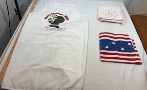 lot 264 image: 2003 Military Family Assistance Christmas Apron and Flag Set