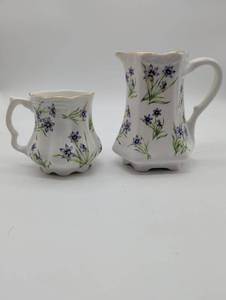 lot 11170 image: Triminghams Bermudiana Floral Creamer and Pitcher Set