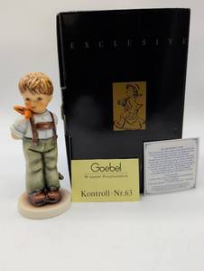 lot 11175 image: Goebel Hummel Boy with Suspenders Figurine #63 with card in box