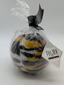 lot 11198 image: Jiche Handmade Sphere Candle - Black and Yellow Tiger Stripe Pattern