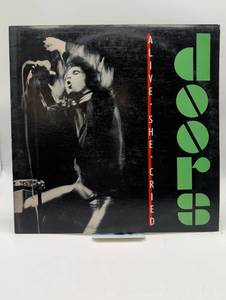 lot 17066 image: The Doors - Alive She Cried LP 1983 Elektra Records
