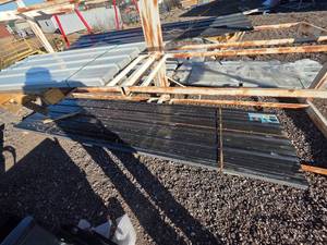 lot 3022826105 image: Black Metal Roofing Panels  12ft x 3ft  35 PCS Bundle  Steel Roof Panels  Construction Surplus