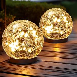 lot 5104 image: 2 Pack Solar Globe Lights Outdoor - Waterproof LED Light Ball, Round Solar Globe Lights - Cracked Glass Solar Lights & Garden Globes - Outdoor Decor for Patio, Yard, Lawn, and Backyard