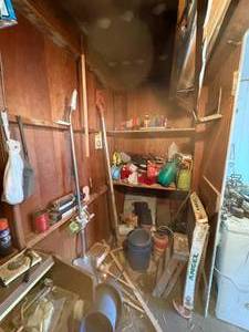 lot 1363 image: East Half of Garage Storage Space Items--Gar