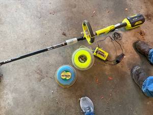 lot 1382 image: Ryobi Battery-Powered Weed Eater w String (40V)--Gar