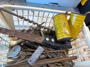 lot 1400 image: Antique Gasoline Measuring Cans, Bits & Hand Saw -- Gar