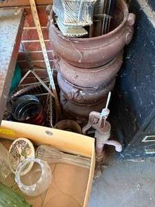 lot 1403 image: Plastic Flower Pots, Mole Trap, Decorative Pump, Table Legs (Whole Pile) -- Gar