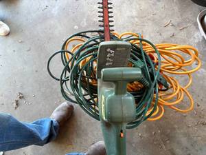 lot 1407 image: Electric Hedge Trimmer & Bucket of Extension Cords -- Gar