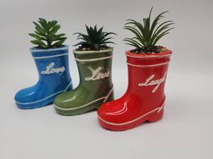 lot 69285 image: Decorative Rain Boot Planters Set of 3 - Retail $35