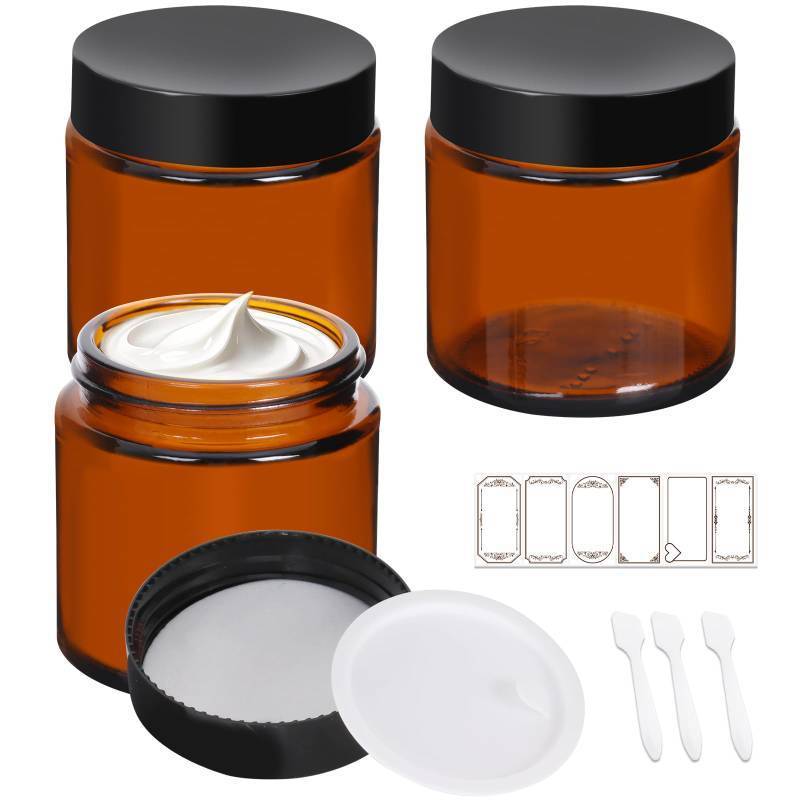 lot 54649 image: 3 Pack 4 oz Amber Glass Jars with Lids, Cosmetic Jars with Black Lids, Glass Lotion Containers, Candle Making Containers for Lotions, Scrubs and Cosmetic, Labels and Spatulas Include