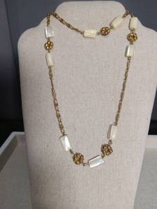 lot 2159 image: Mother of Pearl and Gold Flower Station Necklace