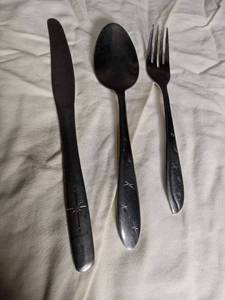 lot 2266 image: Stainless Steel Star Pattern Flatware Set