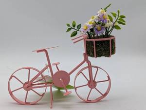 lot 22320 image: Pink Metal Bicycle with Flowers