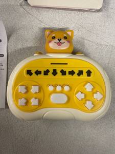 lot 8347 image: Rhythm Master Handheld Games, Shiba Inu